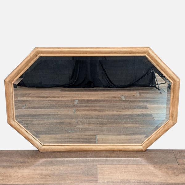1. Octagonal Reperch mirror with a light wood frame, shown resting on a wooden floor.