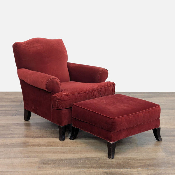 1. Classic red lounge chair with rolled arms, dark wood feet, and a matching ottoman from Crate & Barrel.  