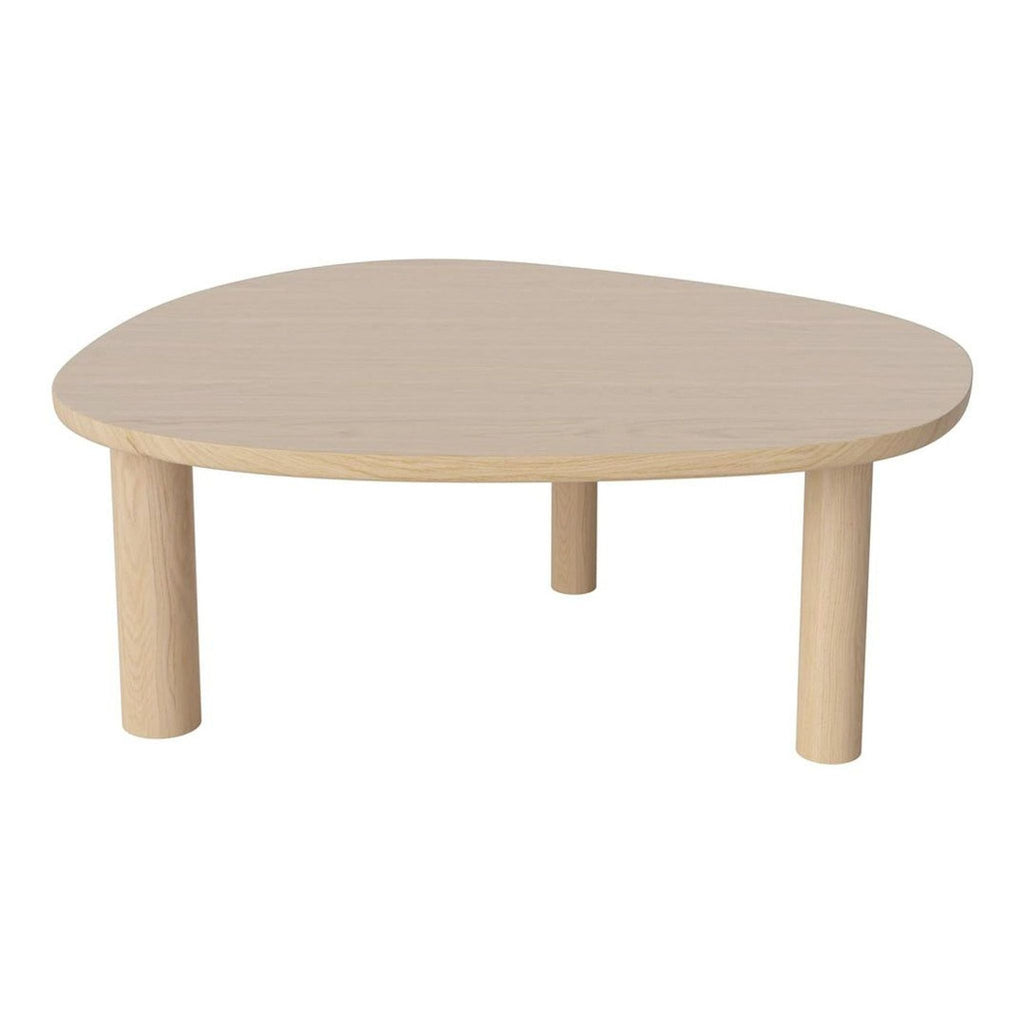 Solid oak coffee table by Design Public with a rounded triangular top and three sturdy legs.
