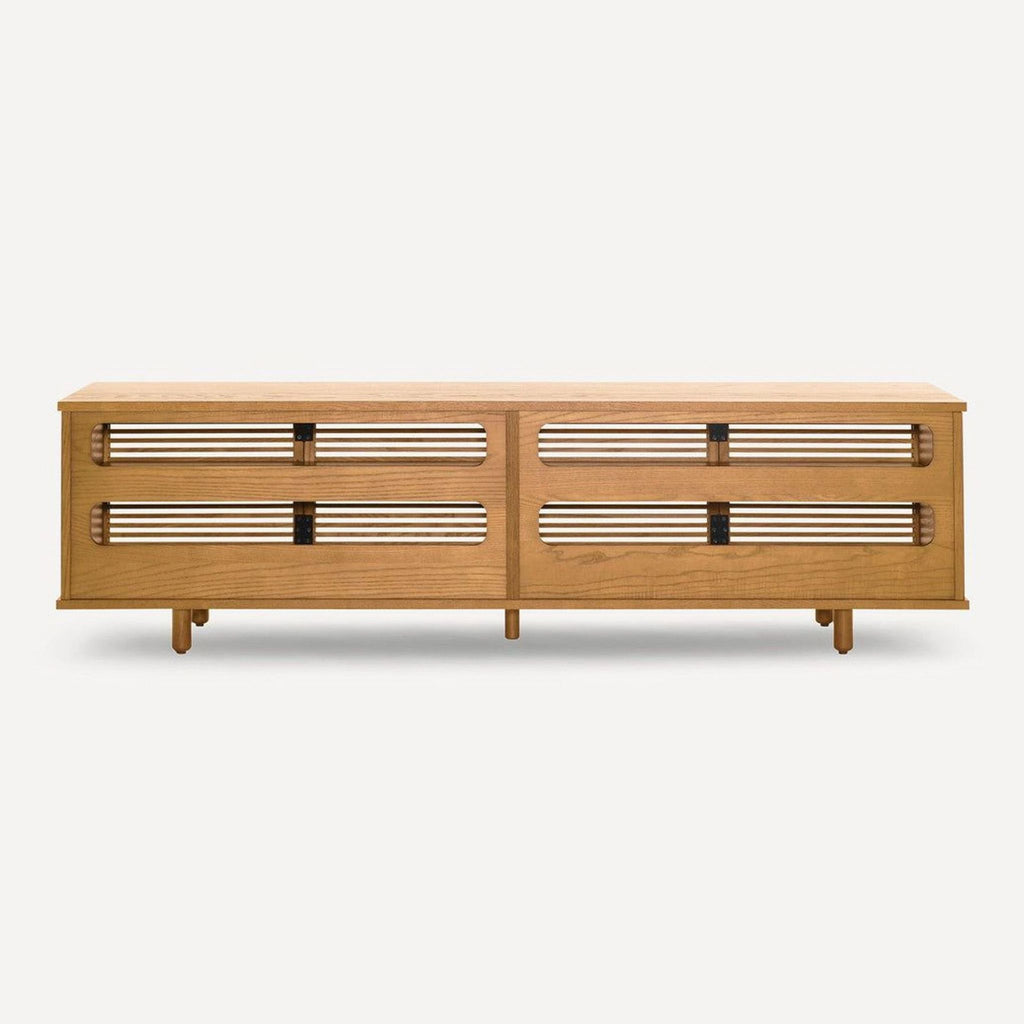2. Modern wood entertainment unit by Burrow featuring ventilated slatted design, designed for quality audio and practical storage.