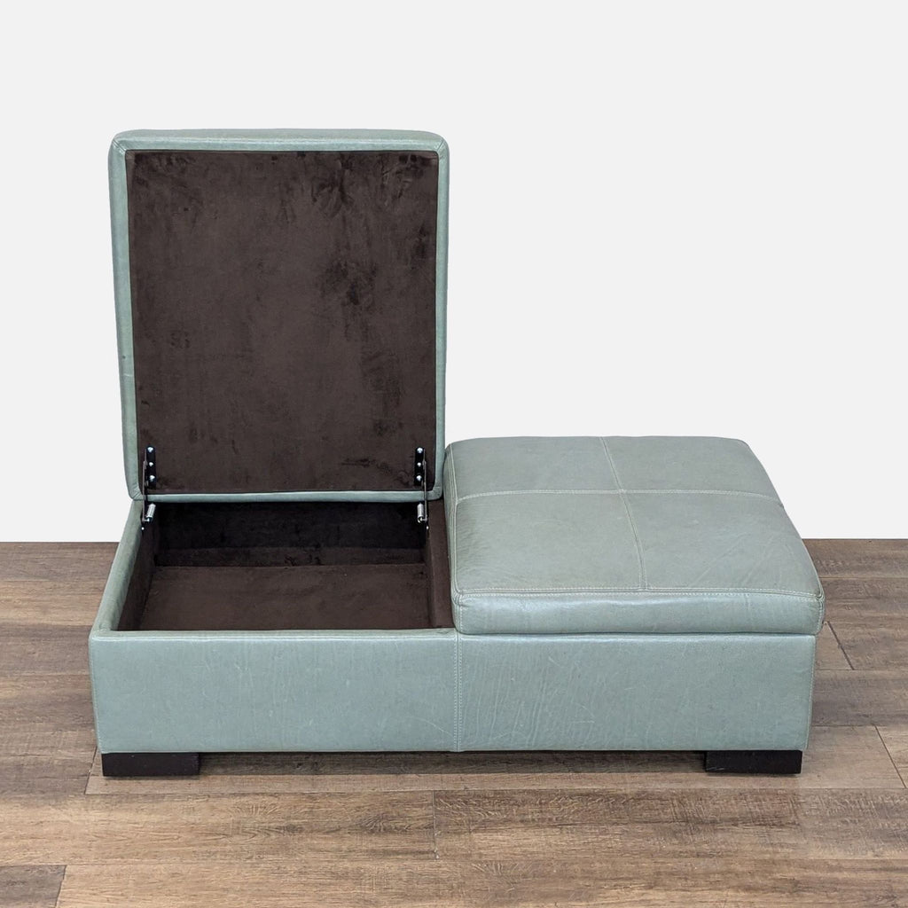3. Reperch storage ottoman with one lid open and one closed, highlighting the dual compartment feature.
