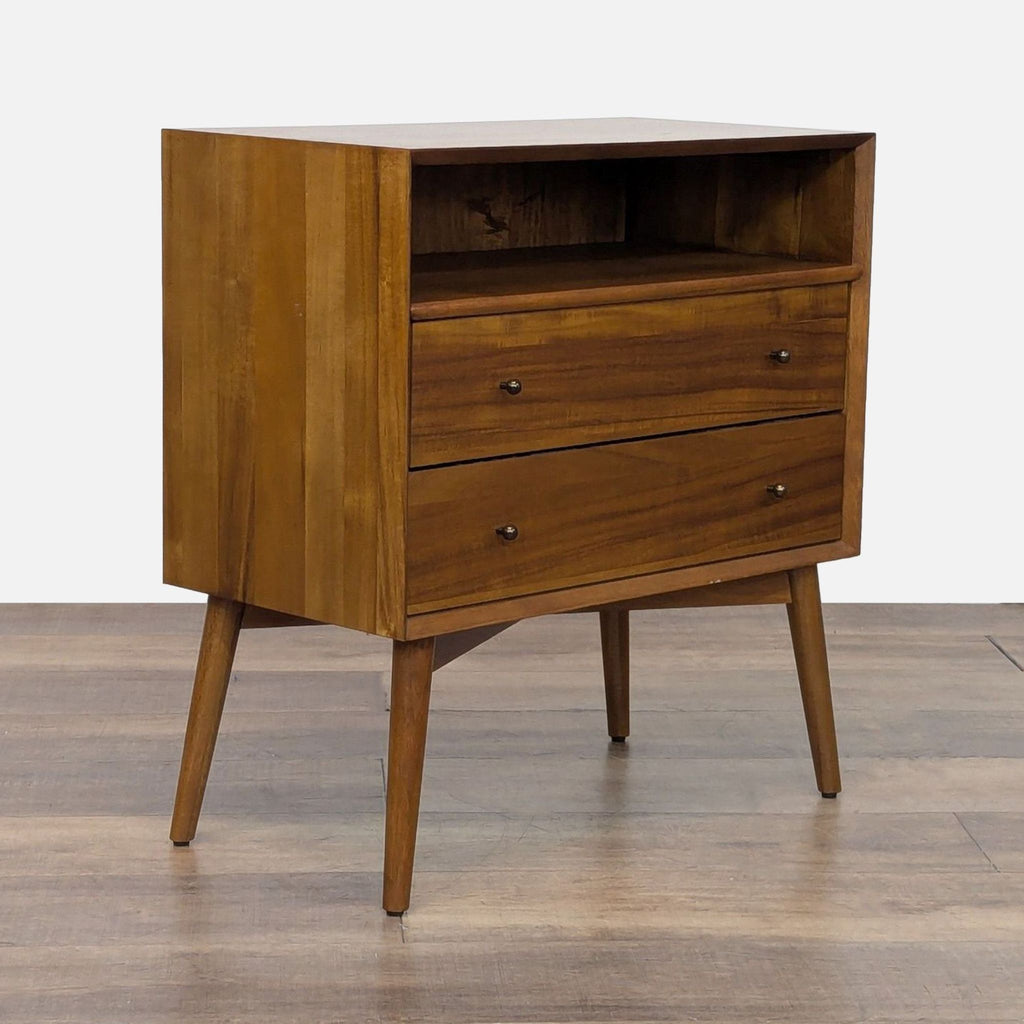 3. Perspective view of West Elm mid-century end table in eucalyptus and acacia veneer, two drawers, raised on slender legs.