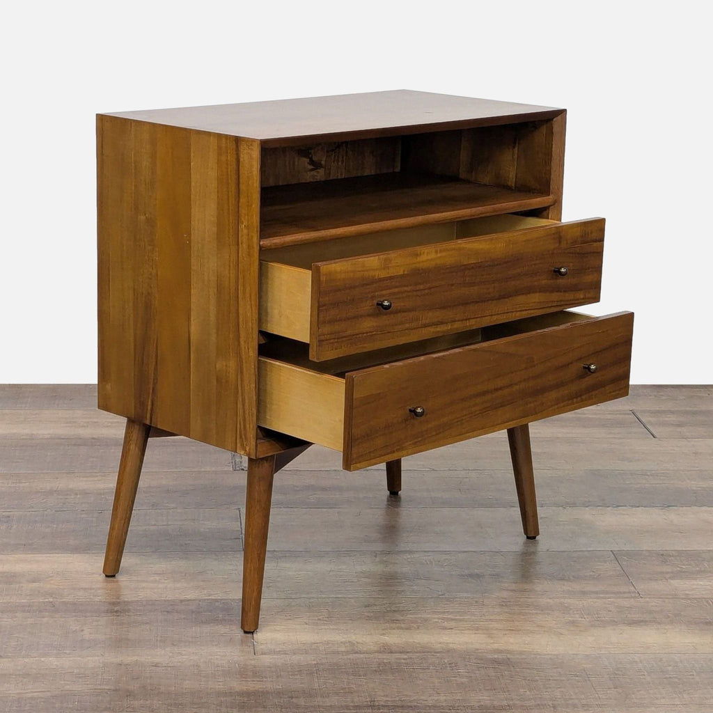 2. Angled view of a West Elm eucalyptus with acacia veneer end table, showing open drawers and tapered legs.
