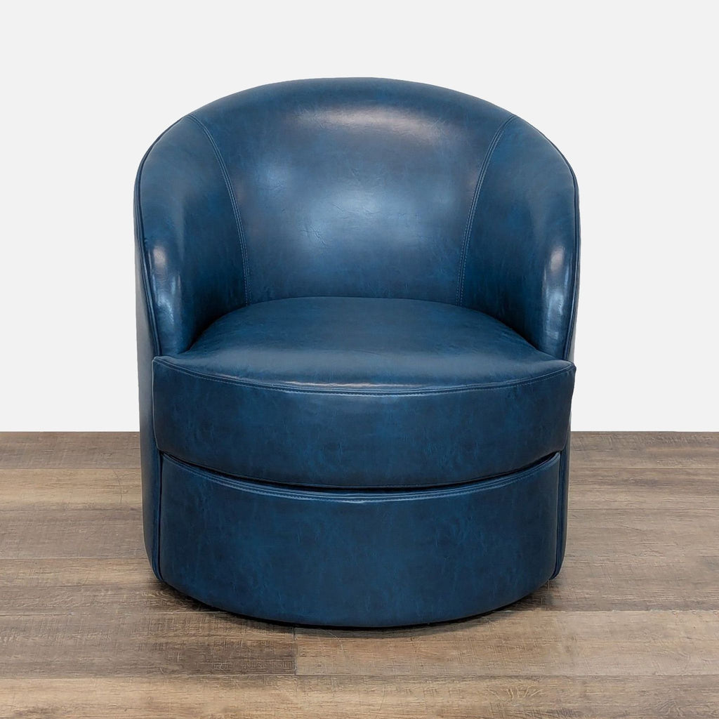 1. Blue faux leather barrel back chair with 360-degree swivel metal base, front view, by Reperch Lounge.