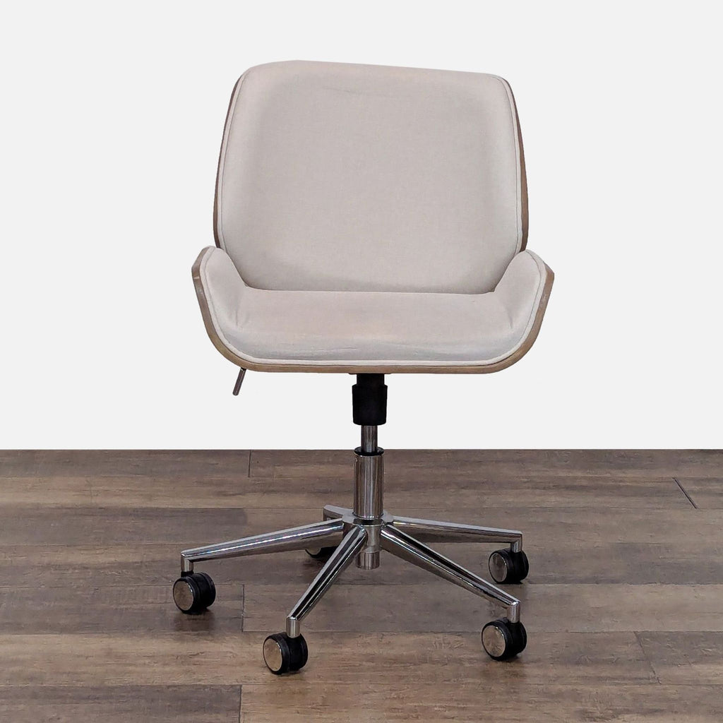 1. Modern Crate & Barrel office chair with cream linen upholstery, bent wood frame, and adjustable chrome base on wheels.