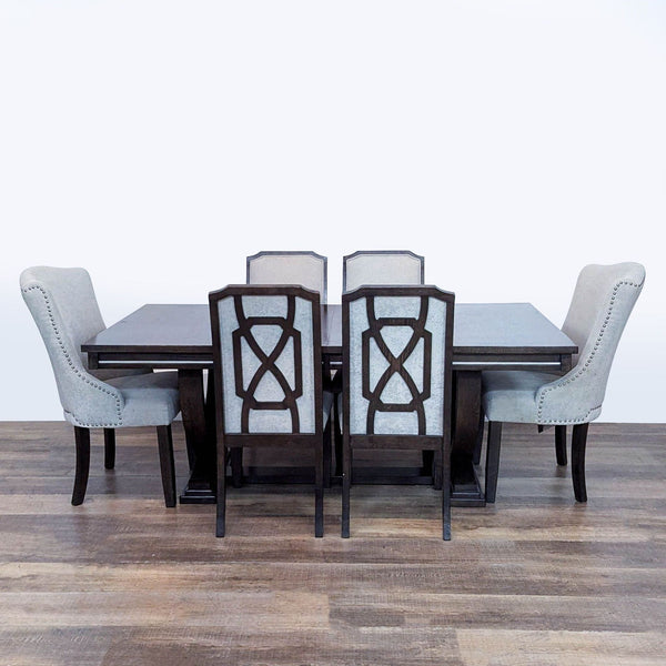 1. Ashley Furniture dining set with extendable table, four dining chairs, and two arm chairs in neutral tones.  