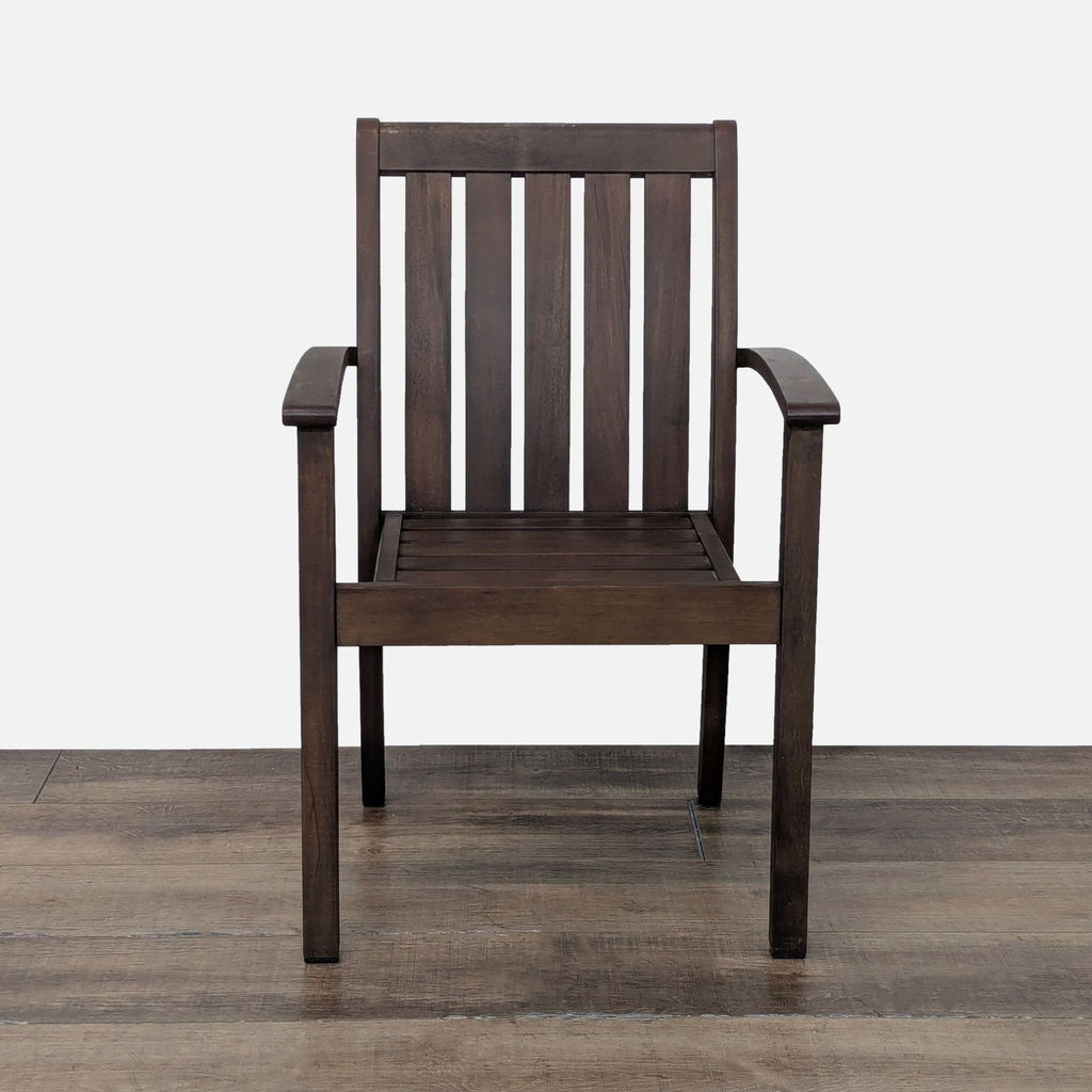 1. Front view of the Pottery Barn Chatham chair made from dark FSC Mahogany with slat design and armrests.