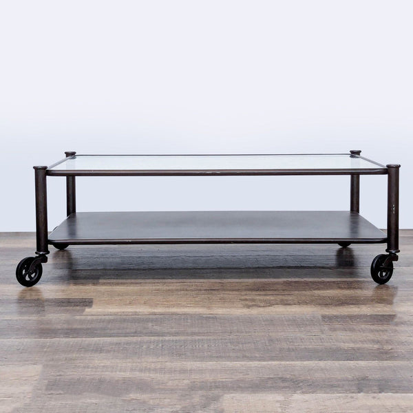 1. Reperch coffee table with glass top, lower shelf, and black metal frame on four caster wheels.