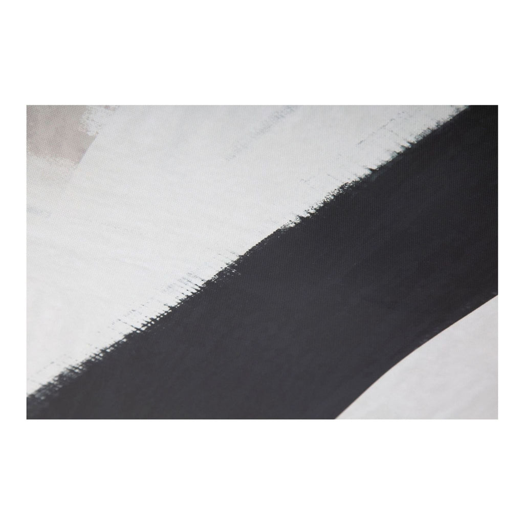 3. Detailed view of the abstract artwork’s bold black brushstroke on a textured white background, from Havenly.