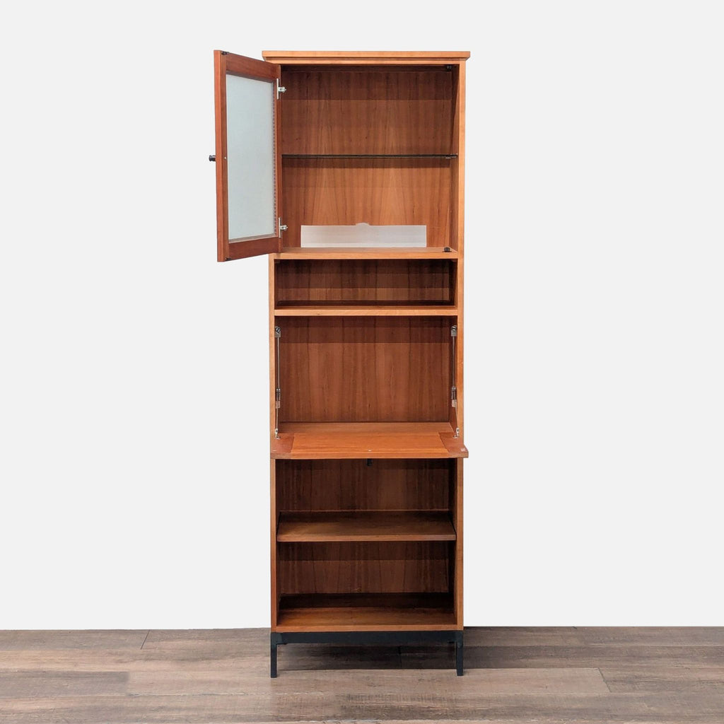 2. Room and Board wooden bookshelf with open frosted glass door, fold-down desk, and multiple storage shelves.