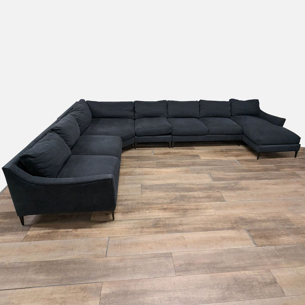 1. Large Jonathan Louis sectional with six modular fabric-upholstered pieces and sleek metal legs, shown in L-shape.