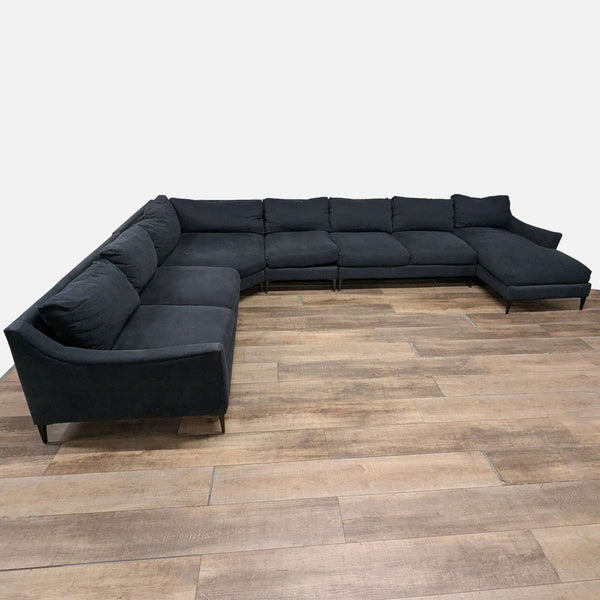1. Large Jonathan Louis sectional with six modular fabric-upholstered pieces and sleek metal legs, shown in L-shape.