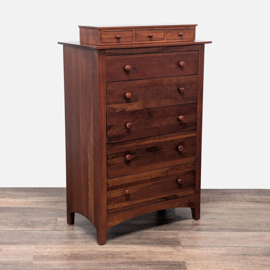 Traditional Ethan Allen dresser made of cherry wood, featuring dovetailed drawers and matching round wood knobs.