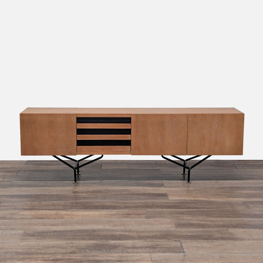 1. Midcentury modern oak credenza on black legs with black oak drawers and clean lines, by CB2.