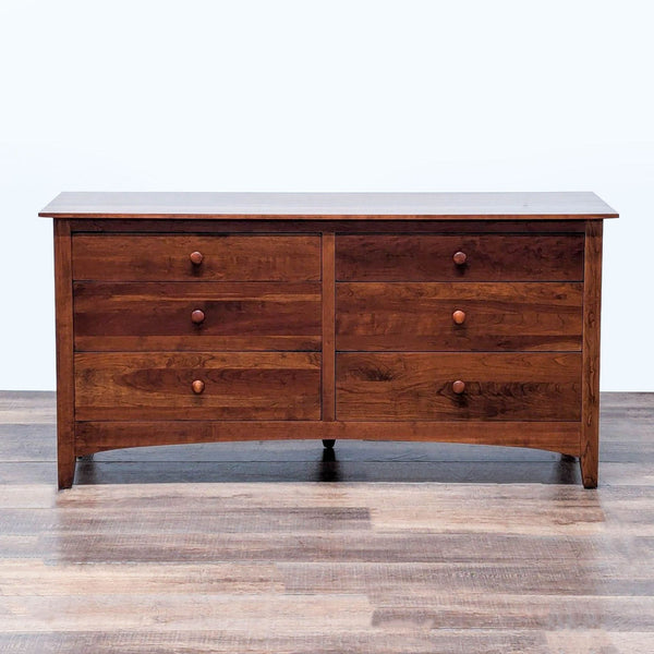 1. Ethan Allen cherry wood dresser with Arts & Crafts design, dovetail joinery, and six flush-mounted drawers.