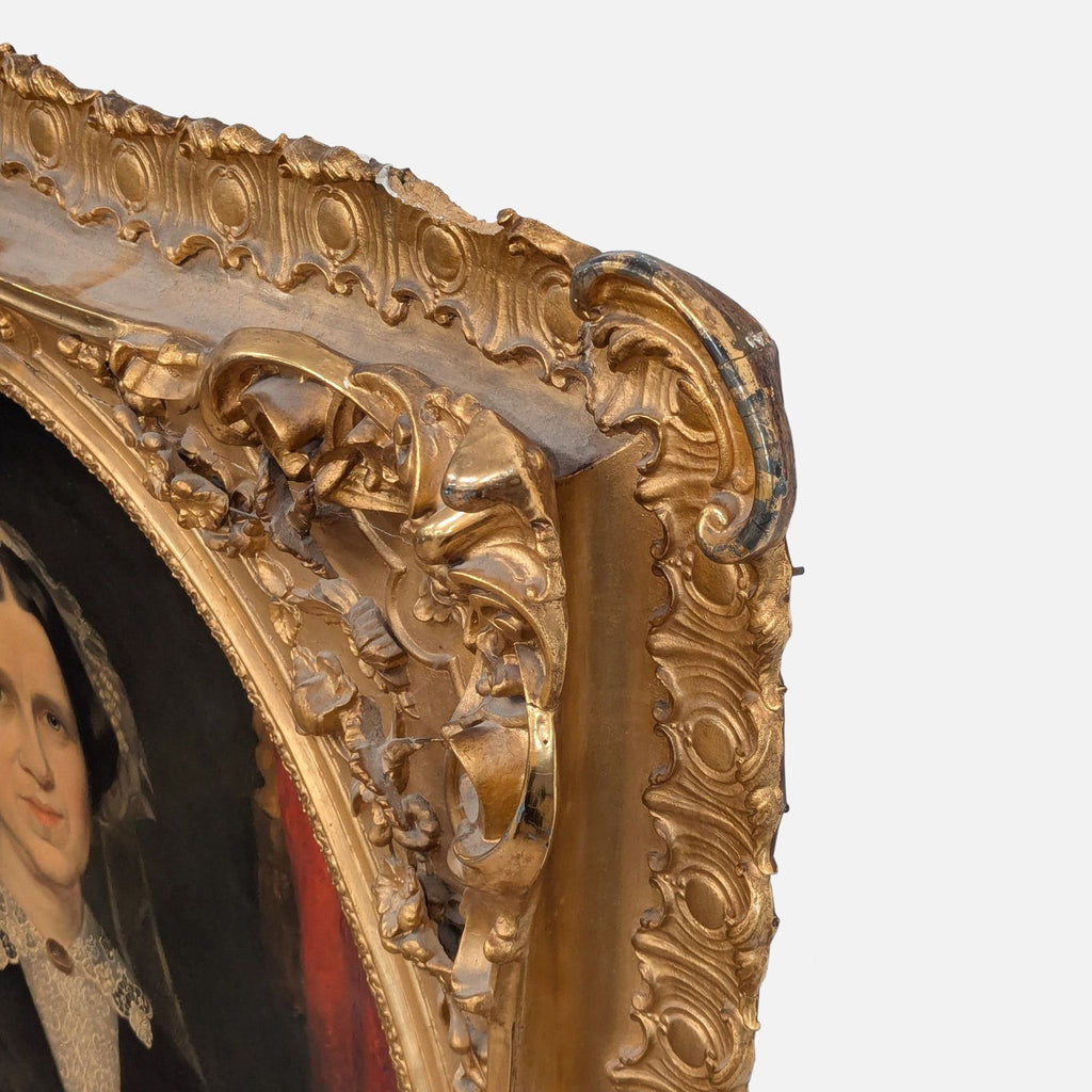 3. Detailed view of the elaborate gold gilded carved wood frame’s corner, showing floral embellishments.
