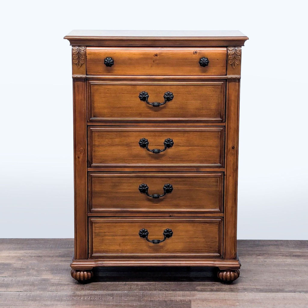 1. Elements traditional oak dresser with antique bronze knobs, spool beading, and fluted bun feet, front view.