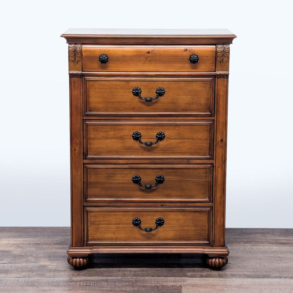 1. Elements traditional oak dresser with antique bronze knobs, spool beading, and fluted bun feet, front view.