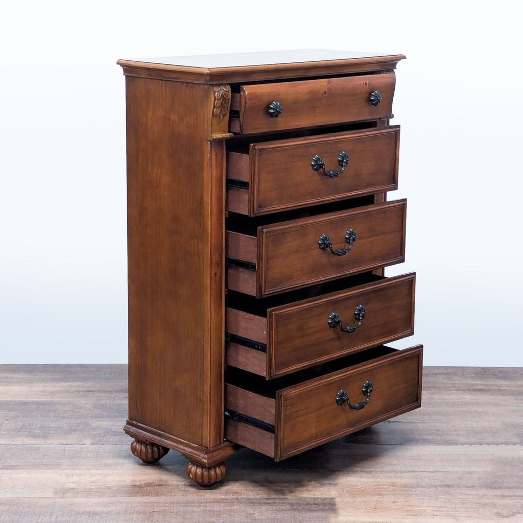 2. Elements wooden chest of drawers, side angle with all drawers partially open, showing interior structure.