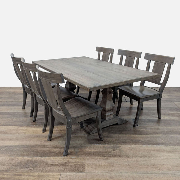 1. Bassett farmhouse dining set with solid maple table and six matching chairs in rustic finish.  