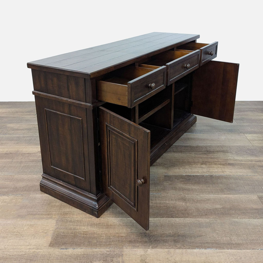 2. Pottery Barn credenza with all drawers and cabinet doors open, revealing interior and exterior shelving.