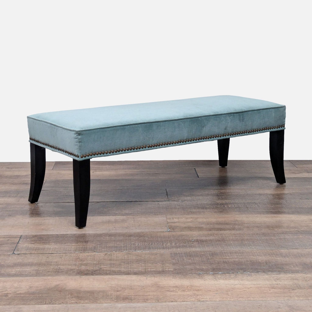 2. Elegant Crate & Barrel bench with linen fabric, hand-placed nailhead trim, and dark tuxedo-finished legs.