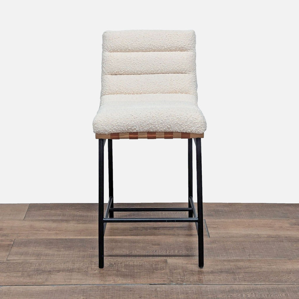 1. Front view of a channel tufted boucle stool with Cognac PU leather accents and black iron legs by Lilola Home.  