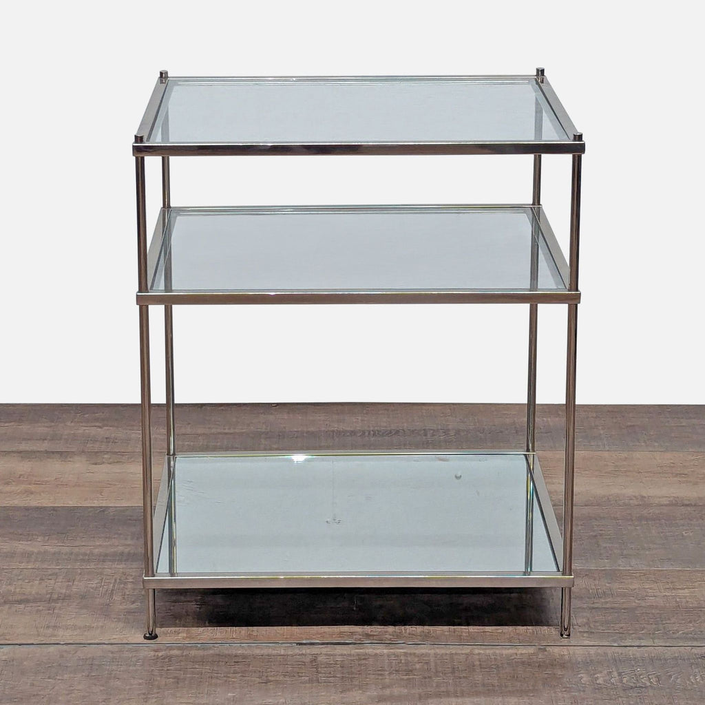 2. Three-shelf end table by Crate and Barrel, featuring a sleek metal frame and glass with mirrored base.  