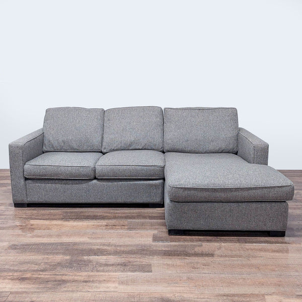 1. Room and Board sectional sofa with track arms, plush sink-in cushions, wood block feet, and a right chaise.