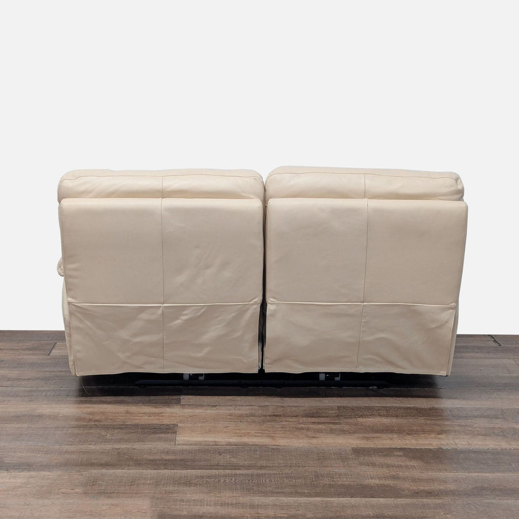 3. Rear view of the Reperch Loveseat, featuring smooth leather upholstery and dual seat backs.