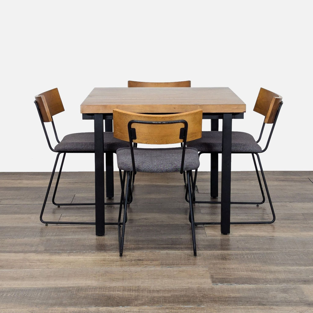 3. Scandinavian Designs dining set showing four wood-back cushioned chairs around a poplar and steel table.