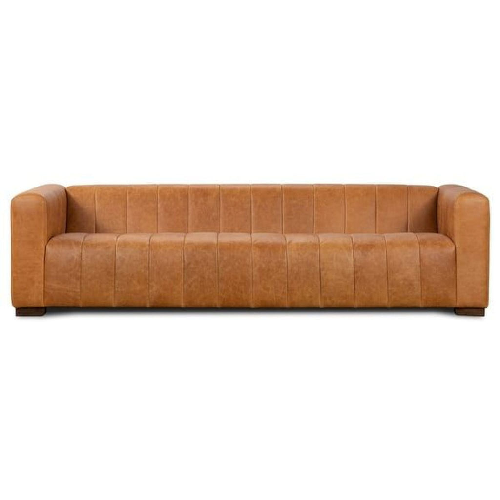 1. Poly & Bark Canale 3-seat sofa with channel-tufted Italian leather and a low profile, shown from the front.