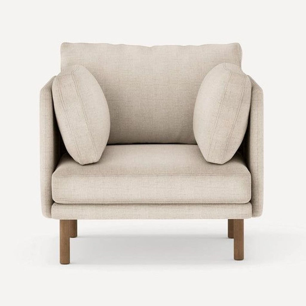 Burrow lounge chair with deep seat, plush cushions, and neutral fabric in a modern, minimal design.