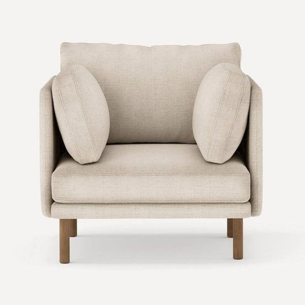Burrow lounge chair with deep seat, plush cushions, and neutral fabric in a modern, minimal design.