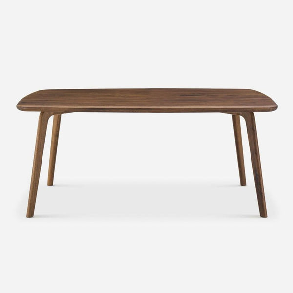 1. Castlery solid American walnut dining table with rounded edges and tapered legs, front view.