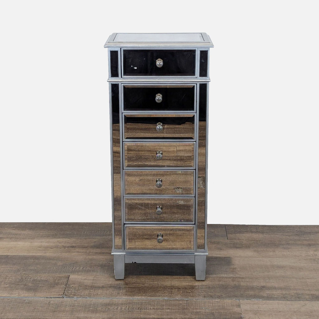 1. Tall Pier 1 Imports dresser with seven drawers, silver wood frame, and mirrored front panels on wooden flooring.