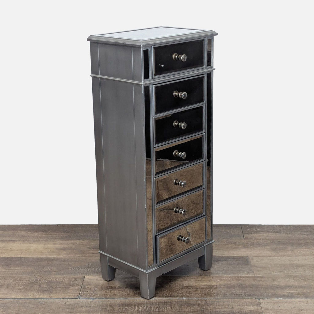3. Angled view of Pier 1 Imports 7-drawer mirrored dresser with silver finish and decorative knobs.