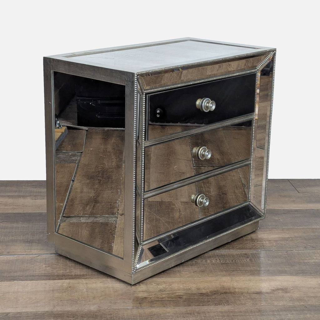 3. Angled view of Z Gallerie end table with hand-applied silver leaf, three drawers, and elegant mirror accents.