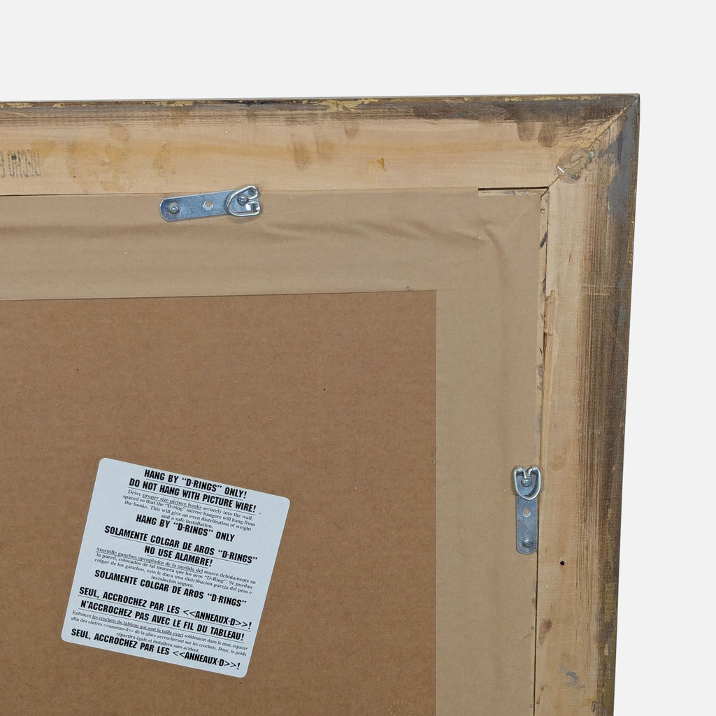 2. Close-up of the back corner of a Reperch mirror, showing mounting hardware and a multi-language warning label.