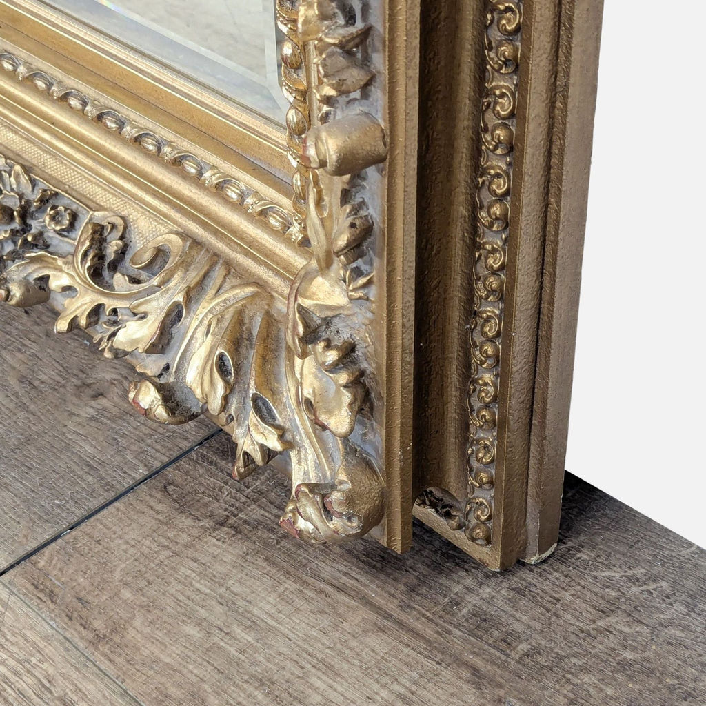 3. Side angle showing the depth and ornate relief of the Reperch mirror’s gold-accented frame and corner details.