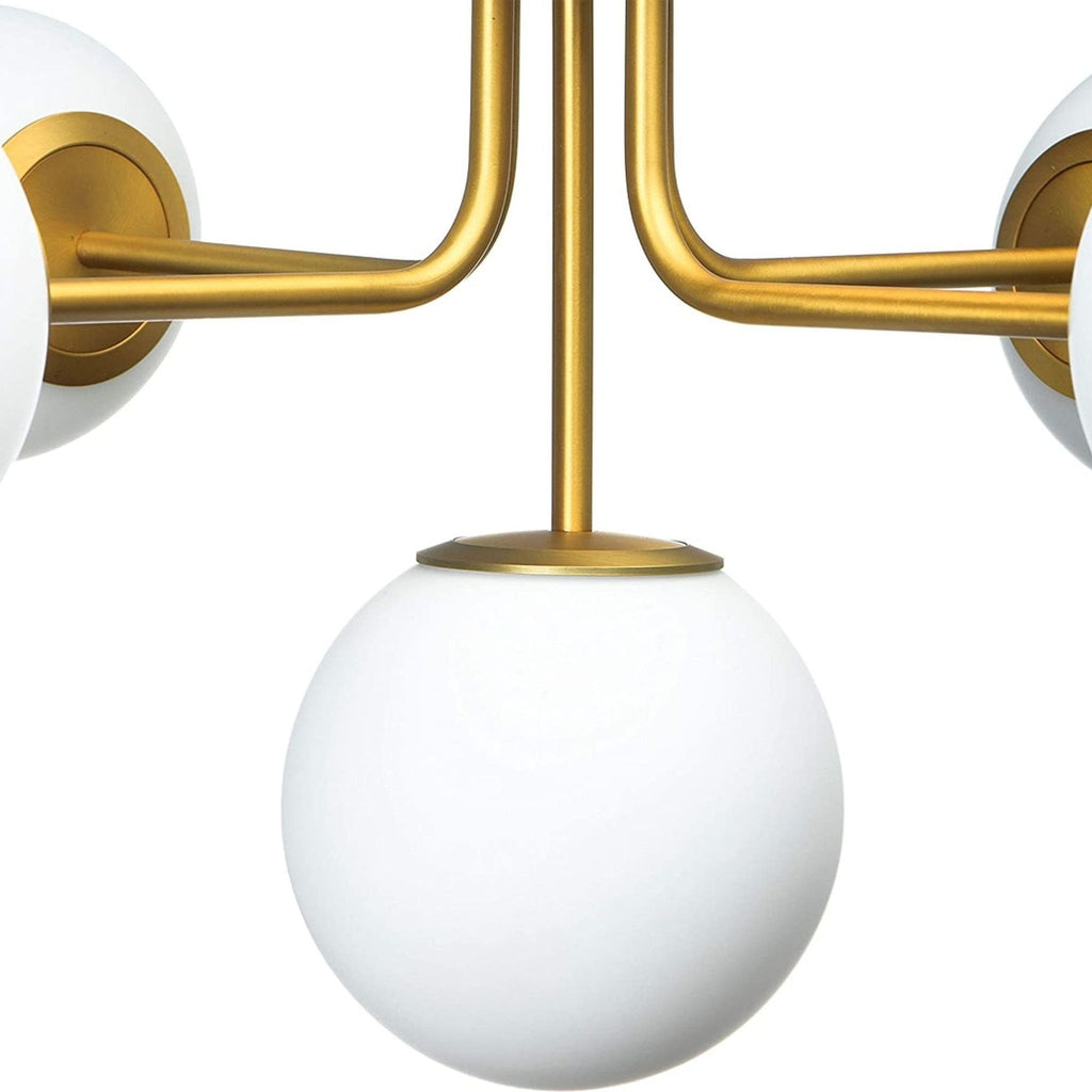 2. Close-up of the frosted opal globes and golden metal details on a Creative Co-Op lighting fixture.