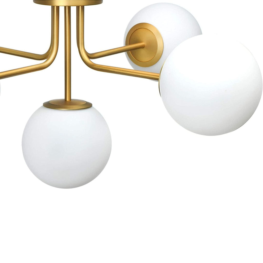 3. Angled view of a Creative Co-Op ceiling light with a round canopy and five white frosted glass globes.