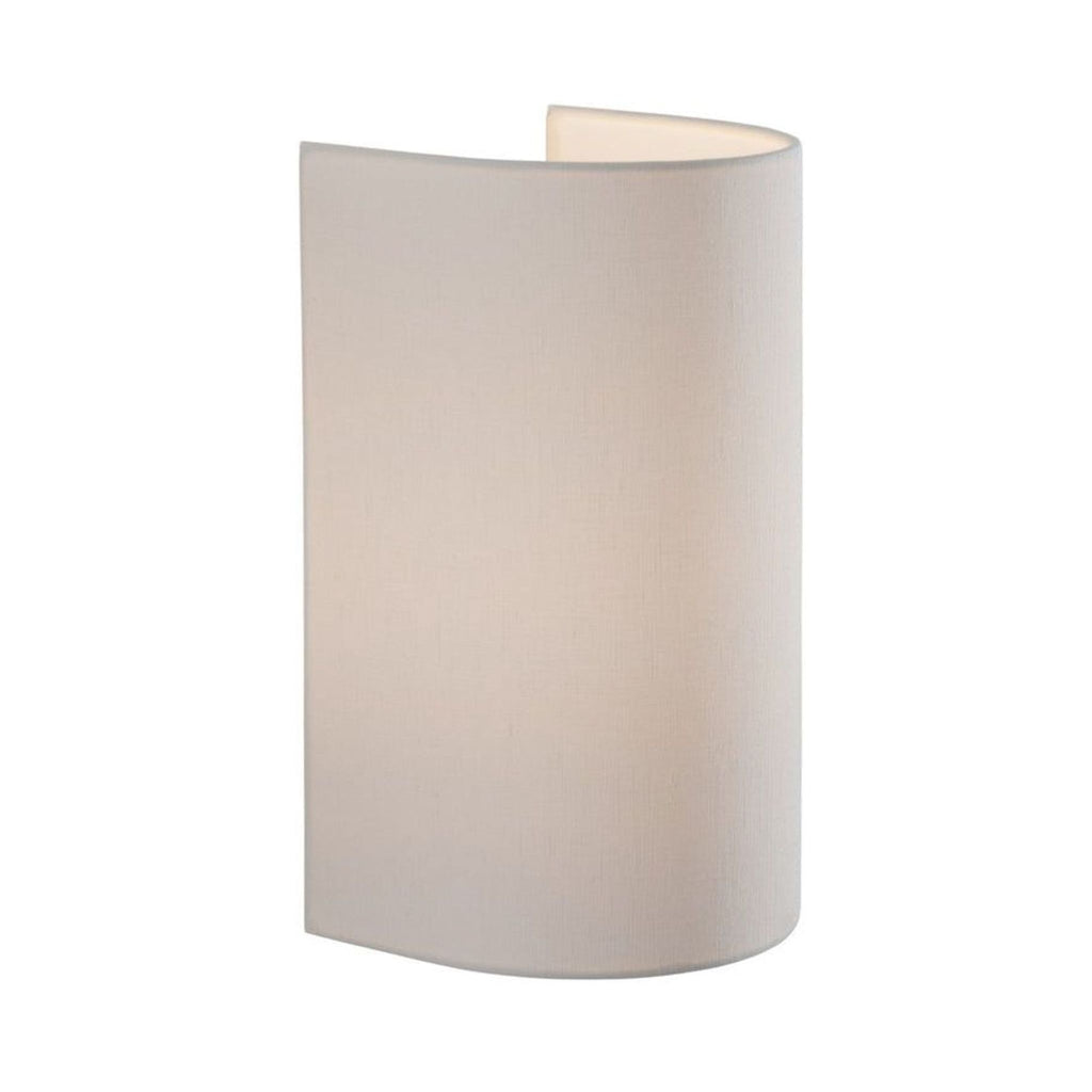 2. Side view of a minimalist lighting fixture with a lightweight, cylindrical white linen shade hiding the inner structure.