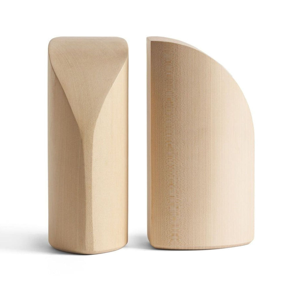 Smooth, hand-finished wooden bookends from 2Modern’s PI collection featuring natural curves and organic lines.  