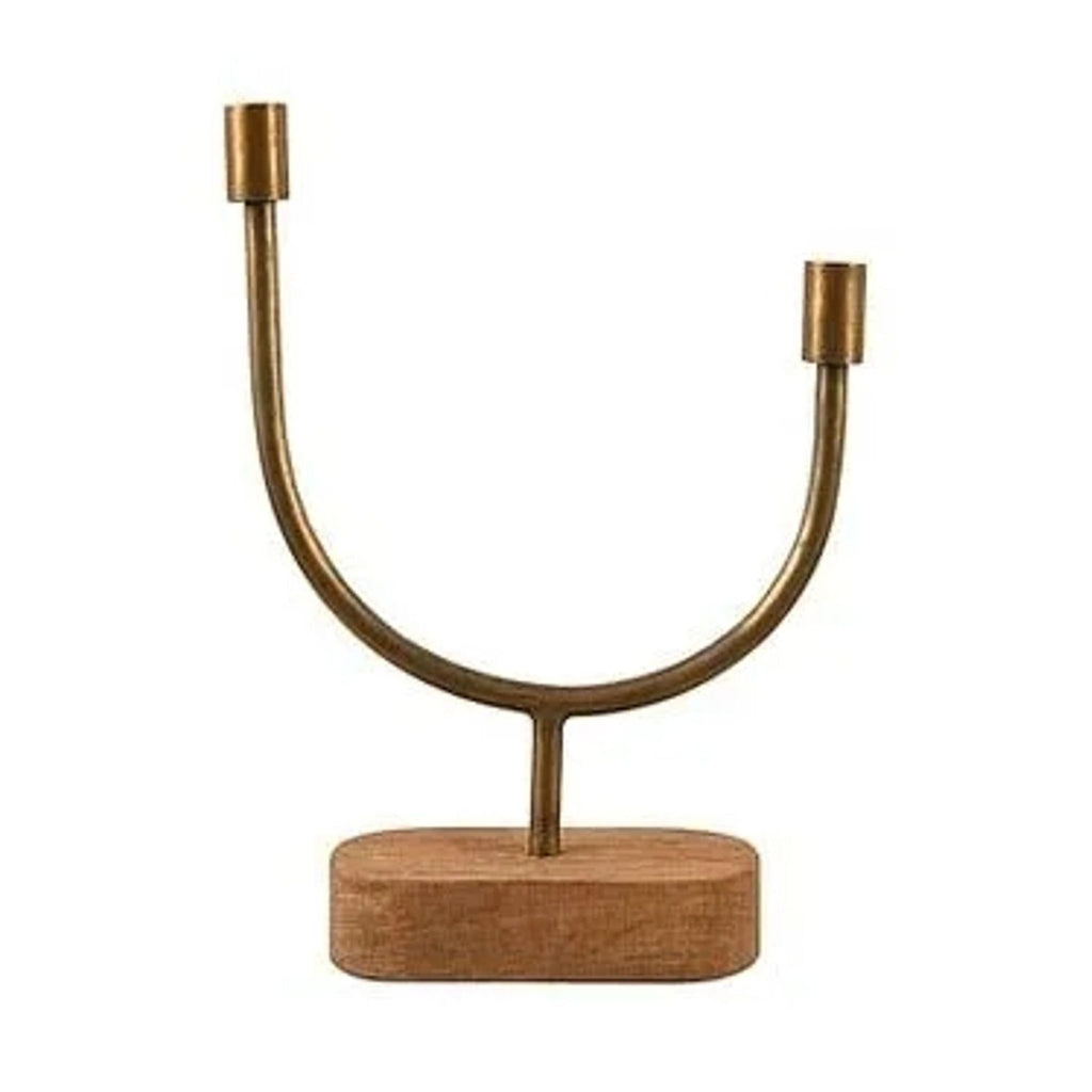 U-shaped metal decor piece with antique gold finish on a wooden base, suited for modern interiors.