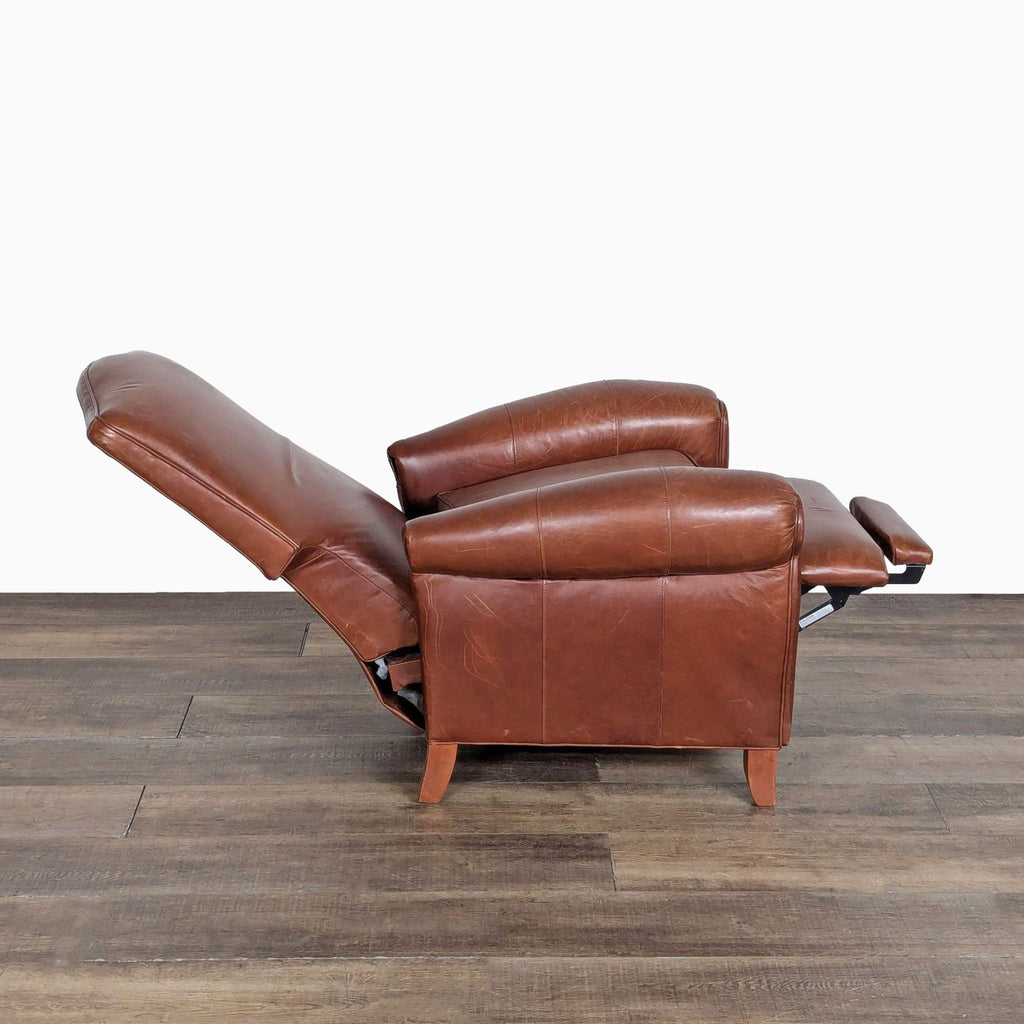2. Side profile showing the Ethan Allen leather lounge chair fully reclined, with extended footrest and back support.