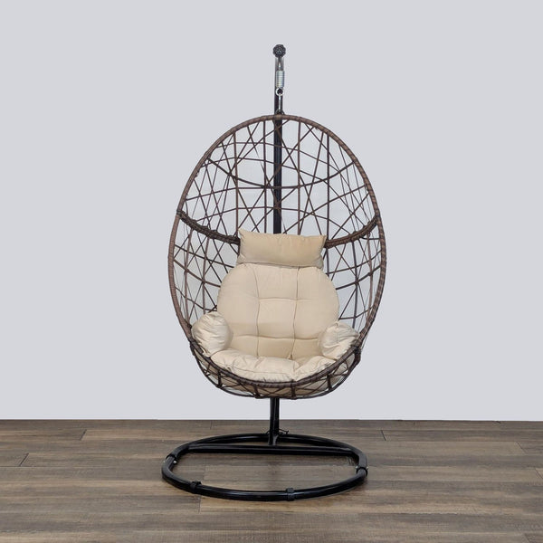 1. Front view of Reperch rattan-style egg chair with weather-resistant cushion and metal stand, for indoor/outdoor use.