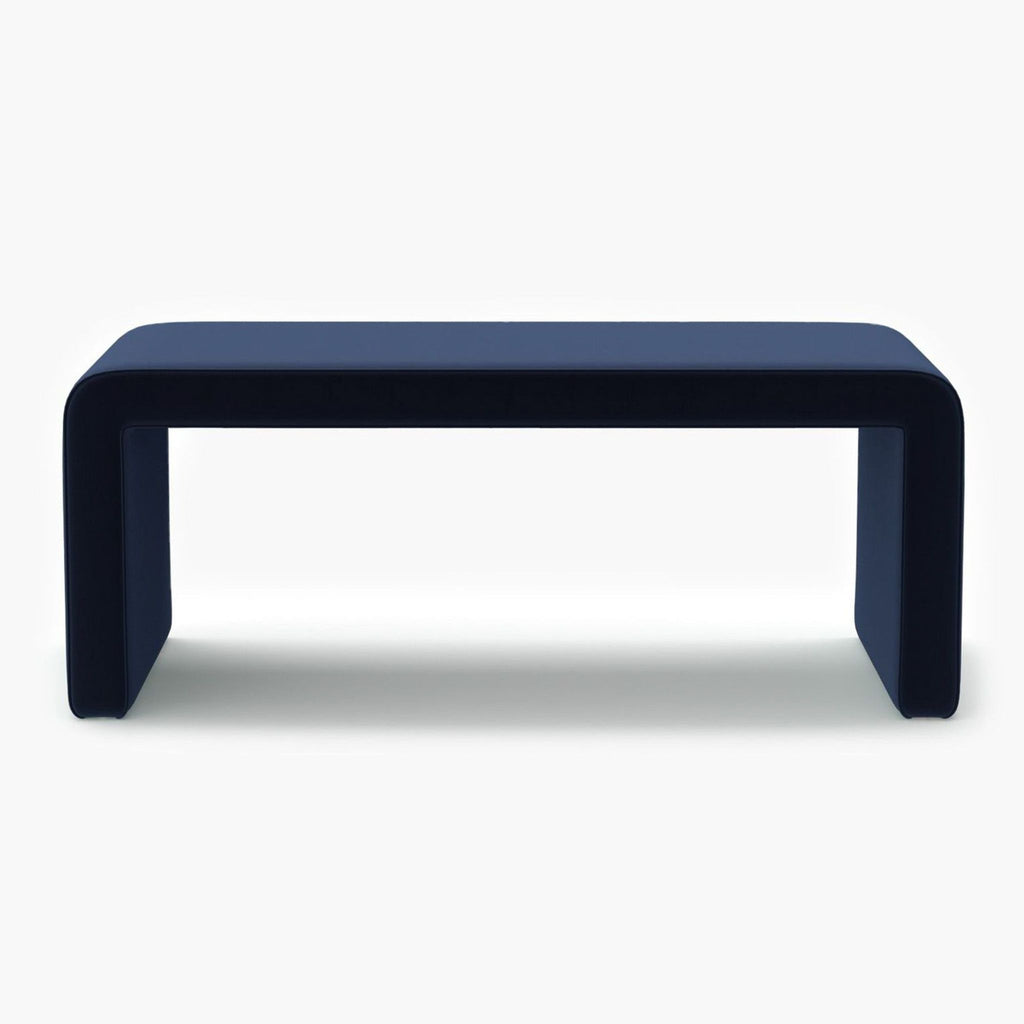 1. Modern navy blue bench by Havenly, covered in everyday linen with smooth, rounded edges.  