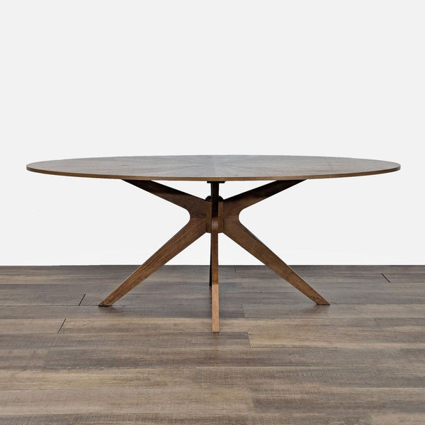 1. Round walnut finish dining table with solid wood legs in a starburst mid-century style, by Article/Bryght.