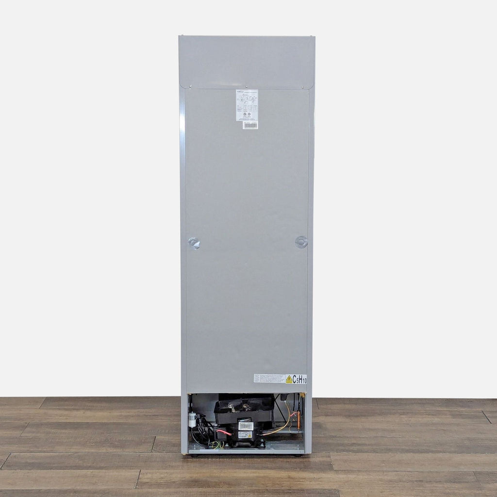 Rear view of the Premium Levella refrigerator displaying the back panel and exposed lower compressor and electrical components.